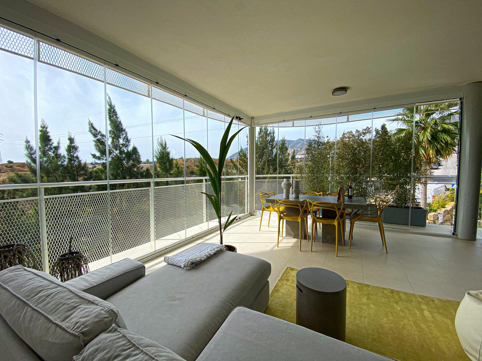 Cortinas de cristal abatibles en Benalmádena - Cerramientos Tejero