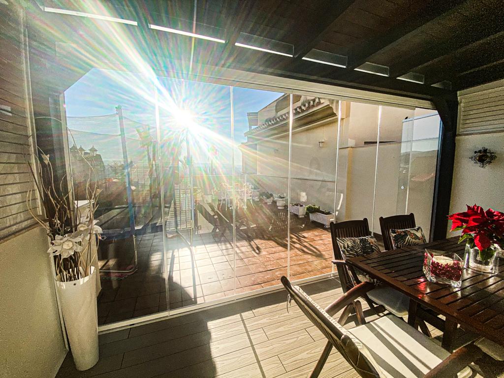 Instalación de cortinas de cristal abatibles en Huetor Vega